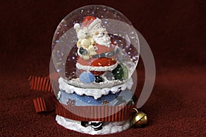 Santa Claus in a crystal water ball