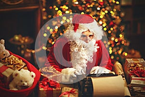 Santa Claus at desk with letters, gifts near Christmas tree