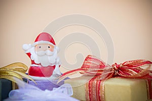 santa claus doll christmas background and gift box and copy space
