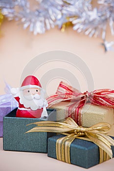 santa claus doll christmas background and gift box and copy space