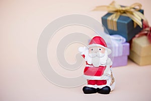 santa claus doll christmas background and gift box and copy space