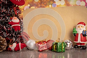 Santa Claus doll and Christmas elements decoration.