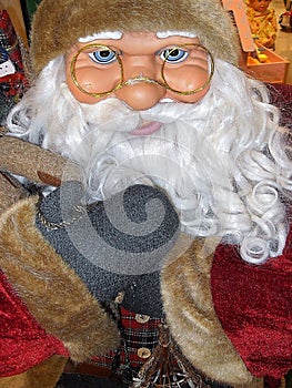 Santa Claus doll ,with glasses.