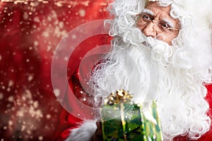 Santa Claus drinking tea Closeup Portrait Isolated on red