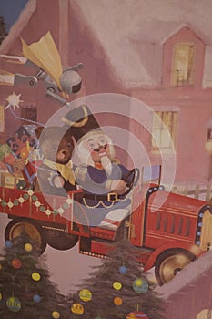 Santa Claus drives a car to provide presents to world children