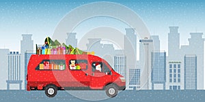 Santa Claus driving a red courier van and delivering gifts in the city street