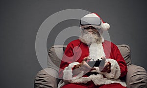 Santa Claus experiencing virtual reality