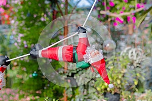 Santa Claus figurine decoration in garden. Concept christmas background