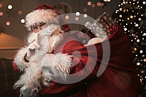 Santa Claus with finger on the lips photo
