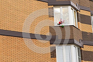 Santa Claus Frost climbs through the window