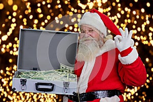 Santa Claus with full case of dollars.