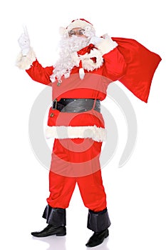 Santa Claus gesticulate while standing straight, isolated over white background. Winter Merry Christmas or New Year