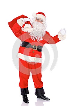 Santa Claus gesticulate while standing straight, isolated over white background. Winter Merry Christmas or New Year