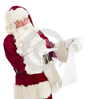 Santa Claus Gesturing At Wish List
