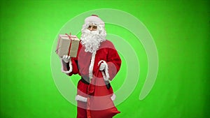 Santa Claus getting presents out of his bag. chroma key