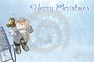 Santa Claus with gifts. Blurred background of the winter night snowy sky. The concept of the New Year. Christmas card.