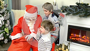 Santa Claus Giving Presents to Children