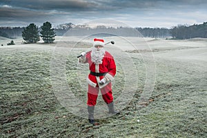 Santa Claus on a golf course in winter frost in the Netherlands