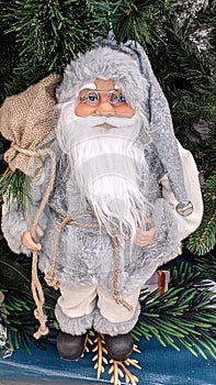 Santa Claus (Grandfather Frost, St. Nicholas, Joulupukki) with gifts. Symbol of New year and Christmas.