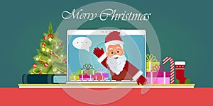 Santa Claus hand greeting via video calling on the laptop