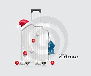 Santa Claus hat draped over white suitcase with Christmas decorations ball hanging from it and passport stuck to side of Luggage