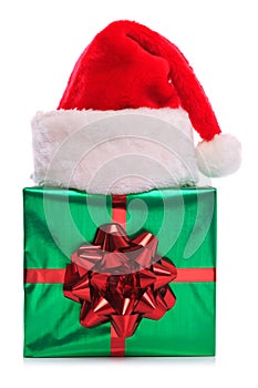 Santa Claus hat and gift wrapped present