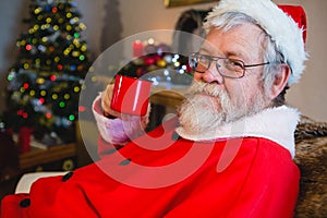 Santa Claus having coffee