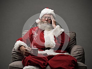 Santa Claus is having an headache