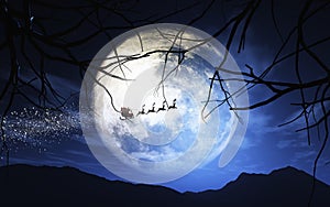 Santa Claus and his sleigh flying in a moonlit sky photo