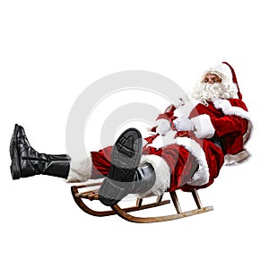 Santa Claus on his sleigh with a sack with presents. Winter snowy day with white snow.