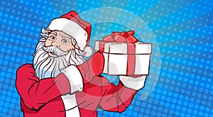 Santa Claus Hold Gift Box Over Pop Art Comic Background Merry Christmas And Happy New Year Poster Design