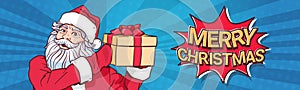Santa Claus Hold Gift Box Over Pop Art Comic Background Merry Christmas Sticker Horizontal Poster Design