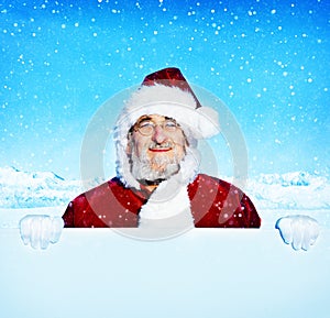 Santa Claus Holding a Blank Sign Snowing Concept