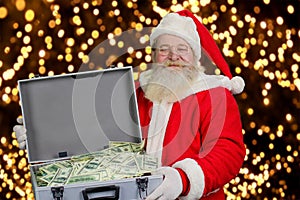 Santa Claus holding case with money.