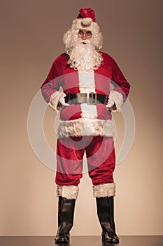 Santa Claus holding his black belt