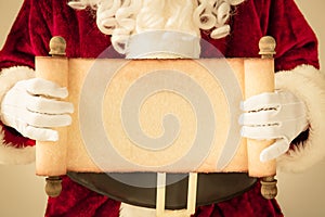 Santa Claus holding scroll paper blank