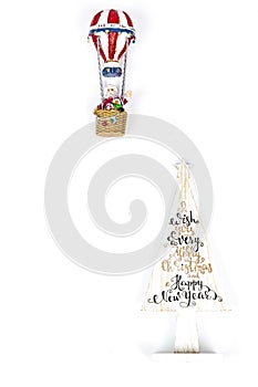 Santa Claus in Hot air balloon flight up to a wood white tree, on white background