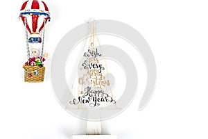 Santa Claus in Hot air balloon flight up to a wood white tree, on white background