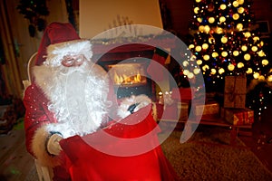 Santa Claus look at magical sac photo