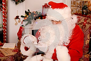 Santa Claus looking at pocket watch