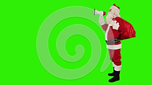 Santa Claus with a loudspeaker making an announcement, Green Screen, stock footage