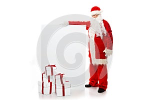 Santa Claus with many gift boxes