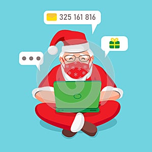 Santa Claus in medical mask wishes remotely Merry Christmas and New Year 2021 during coronavirus quarantine. Sits with