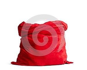 Santa Claus open red bag full, isolated on white background. File contains a path to isolation