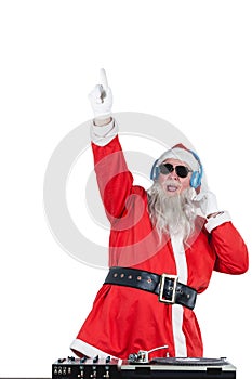 Santa claus playing a dj photo