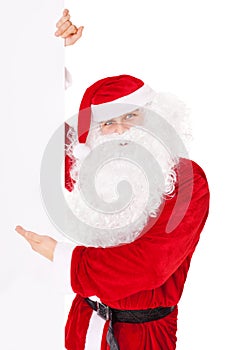 Santa Claus pointing at banner isolated on white