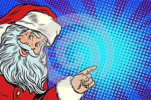 Santa Claus pointing to copy space