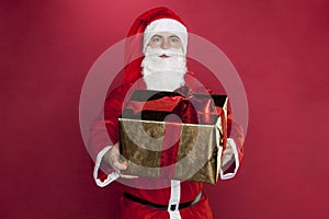 Santa Claus presents a gift