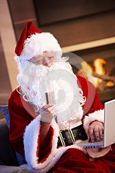 Santa Claus purchasing on internet