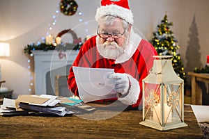 Santa Claus reading a letter